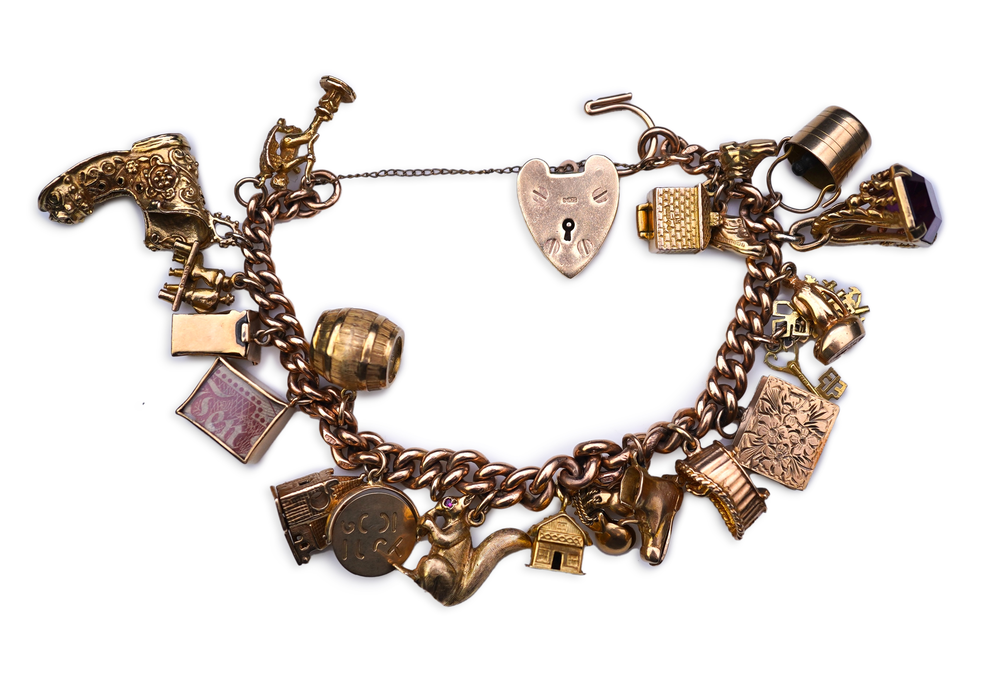 A 9ct gold charm bracelet, mid 20th century
